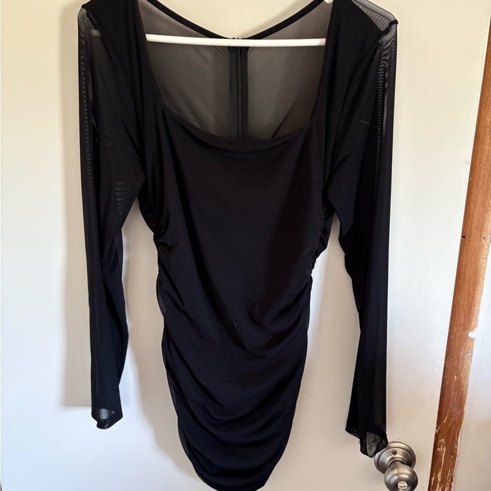 Elegant Black Mini Dress by [Brand]